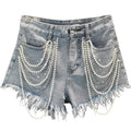 Pantalones cortos vaqueros con borlas de perlas