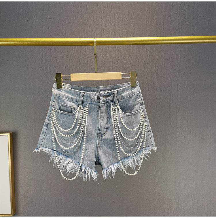 Pantalones cortos vaqueros con borlas de perlas