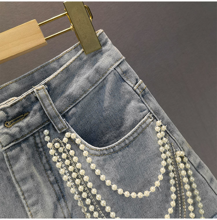 Pantalones cortos vaqueros con borlas de perlas